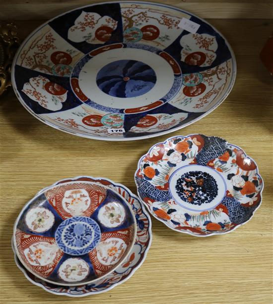An Imari charger and three dishes charger diameter 36cm